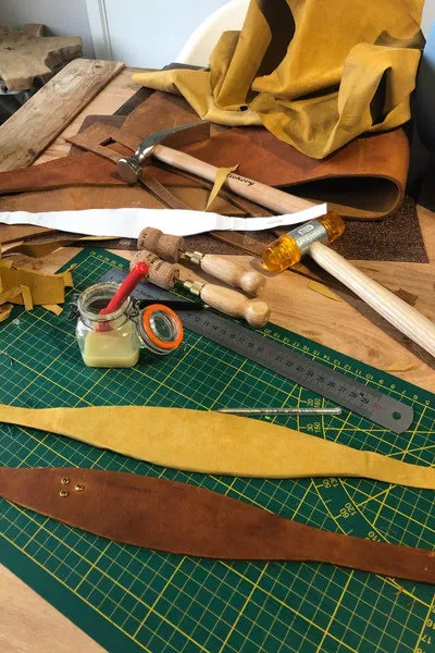 Materials and tools for making a leather dog collar