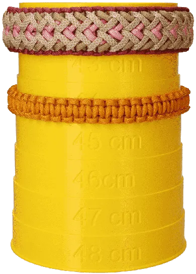 two paracord dog collars compared on a measuring tower