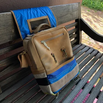 Brown and blue leather bag by the mark Travelban